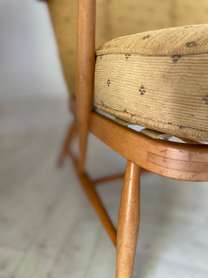 Close-up of seat detail on vintage Ercol Windsor grandfather chair