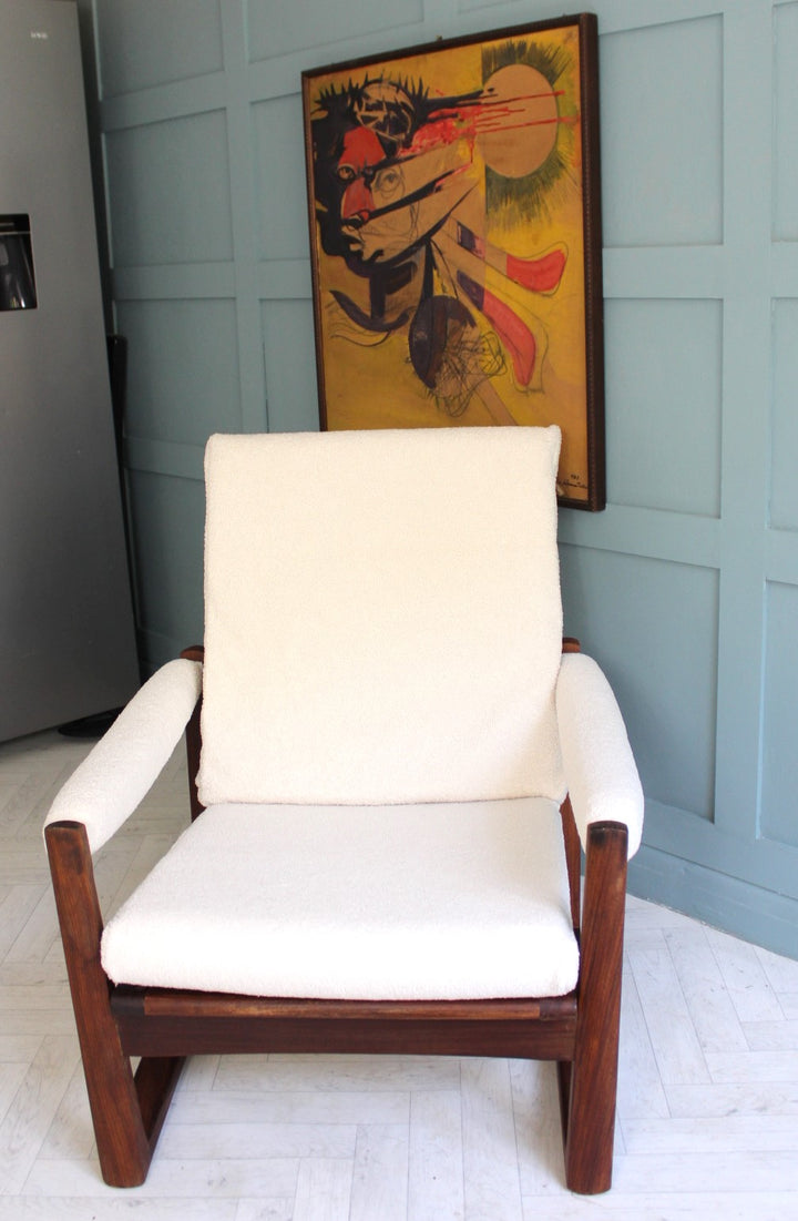 Mid-century modern teak armchair with retro design and Danish oil finish