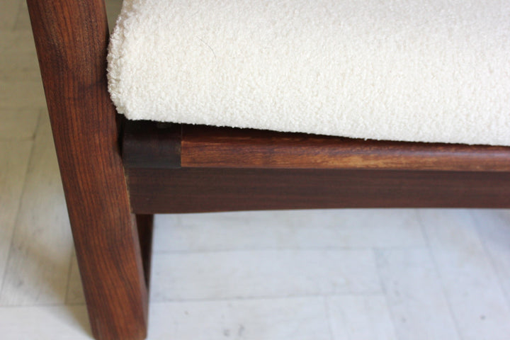 Midcentury Afromosia wood armchair with timeless design and ergonomic comfort