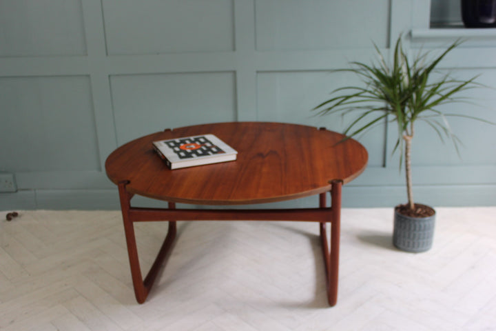 "Elegant vintage teak coffee table with sledge legs, designed by Peter Hvidt for France & Son, Scandinavian modern style."