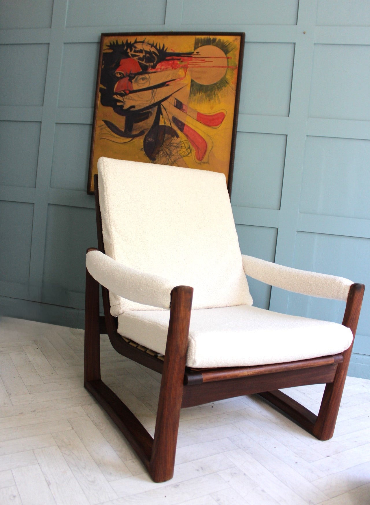 Refurbished midcentury modern armchair with solid teak wood frame and plush boucle cushions Sussex