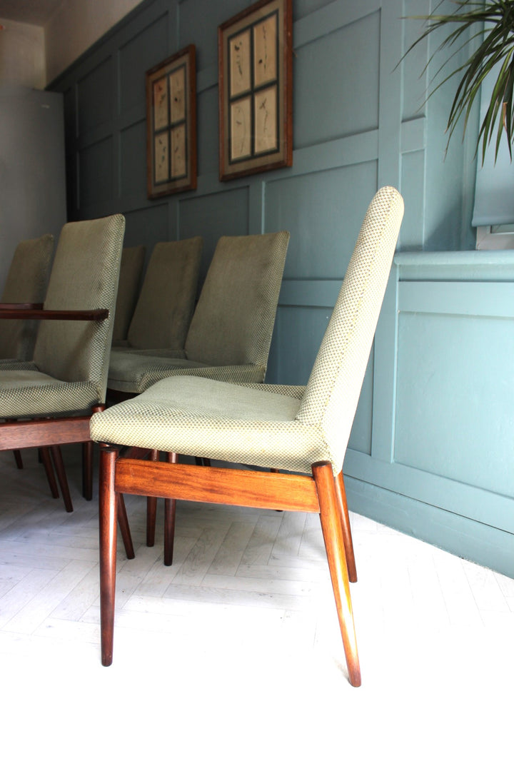 Set of six mid-century dining chairs in Danish Rosewood with floating upholstered seats by Robert Heritage for Archie Shine