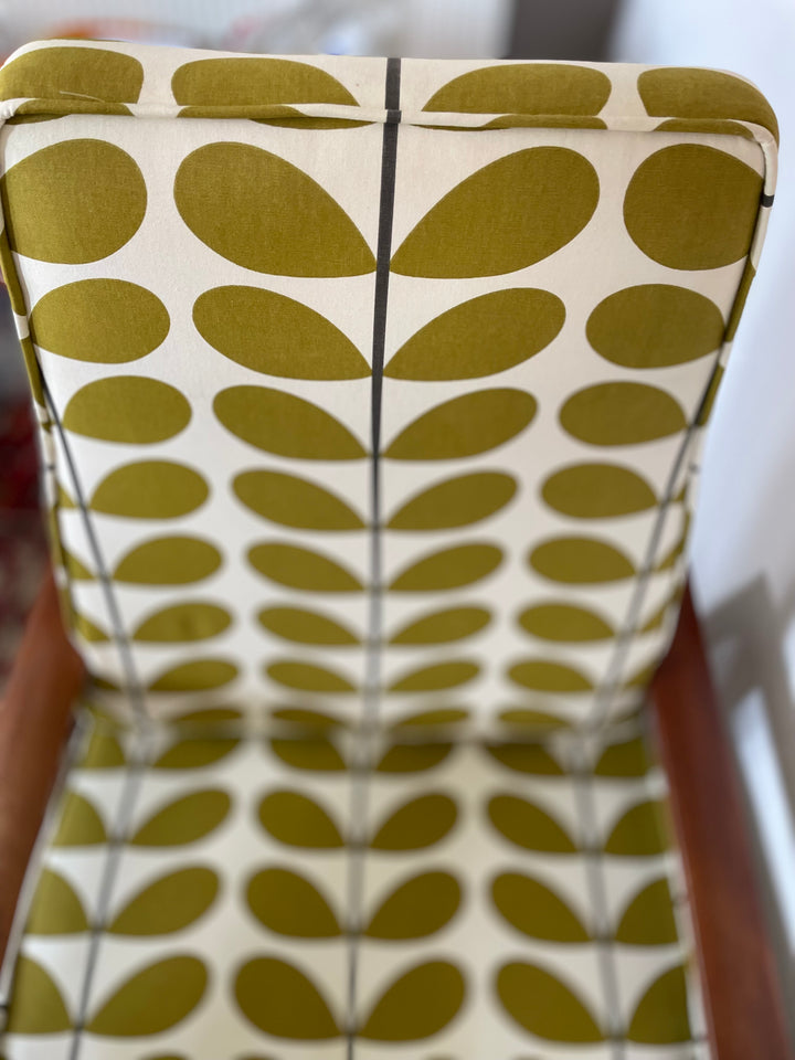 Side view of vintage Danish rocker with modern upholstery