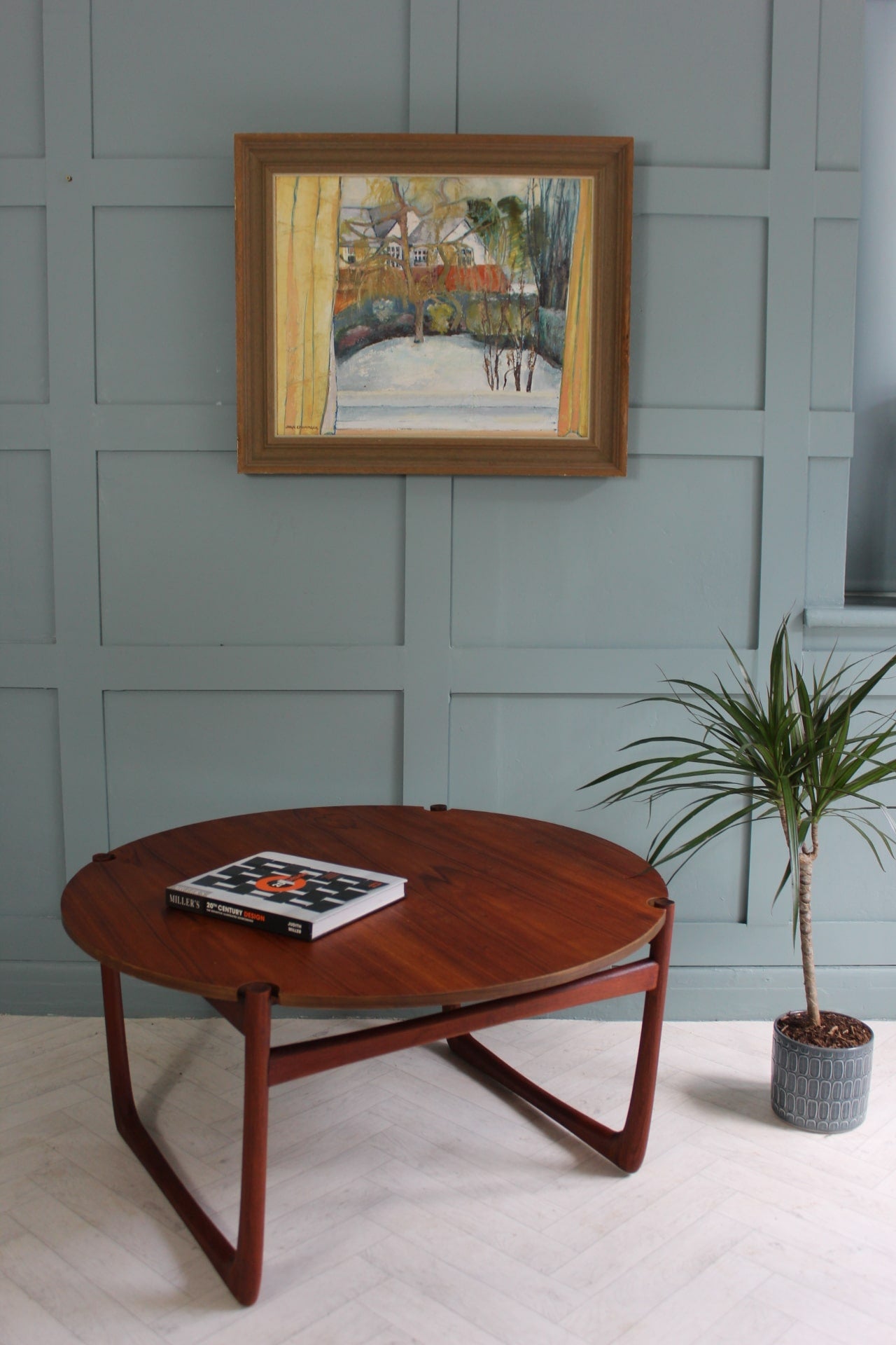 "Classic mid-century round teak coffee table by France & Son, Danish design with solid wood construction."