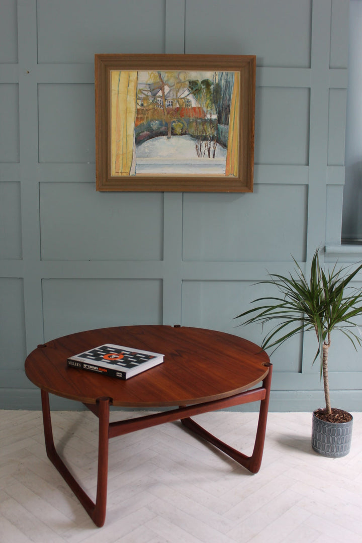"Classic mid-century round teak coffee table by France & Son, Danish design with solid wood construction."