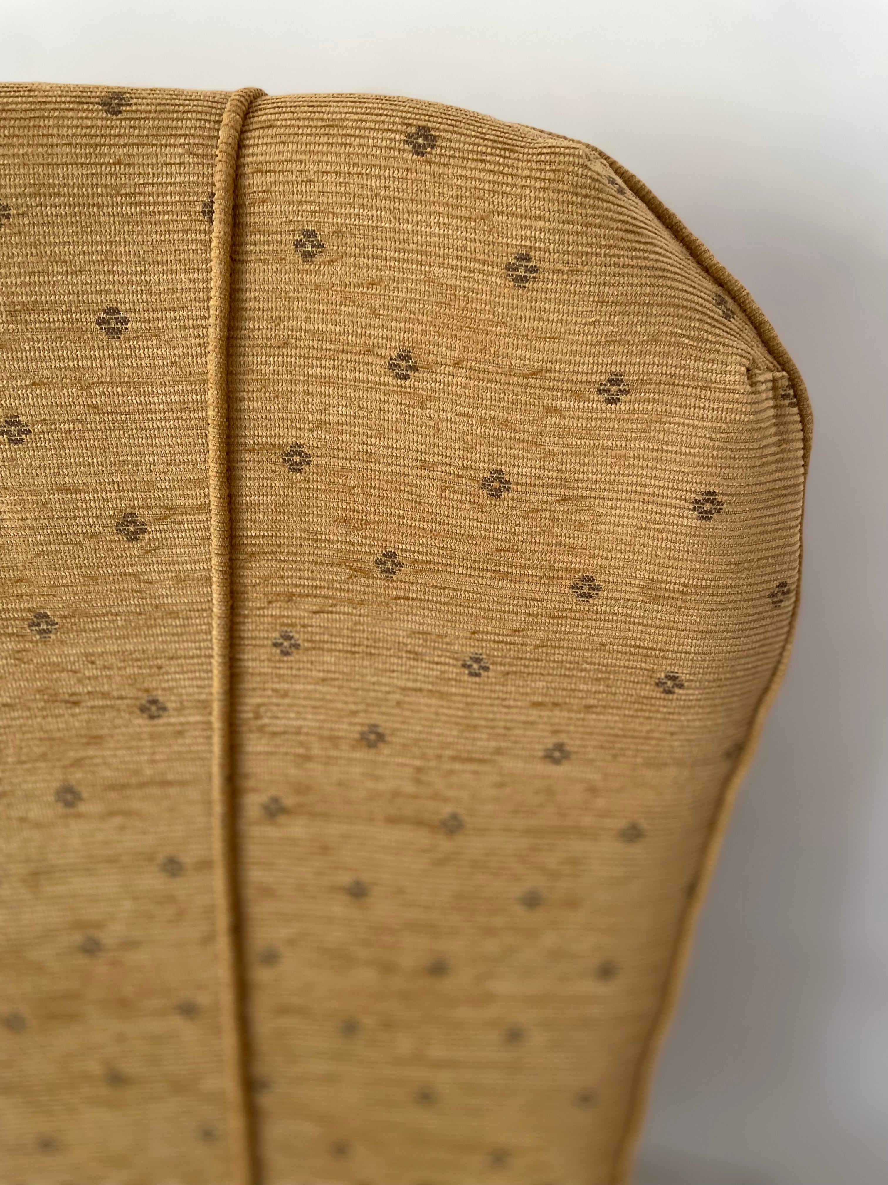 Vintage Close-up of a brown fabric with a subtle pattern on a white background