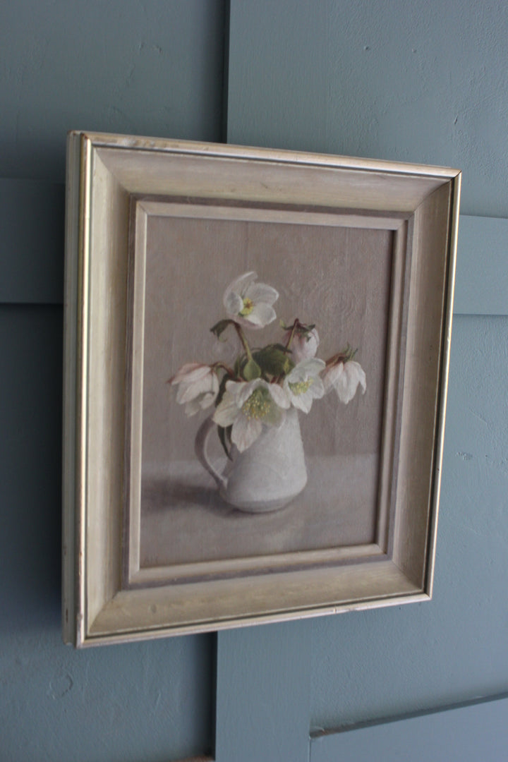 Winter still life art featuring Christmas roses in Lucie Rie jug, floral oil painting by Anna Hornby for home interior