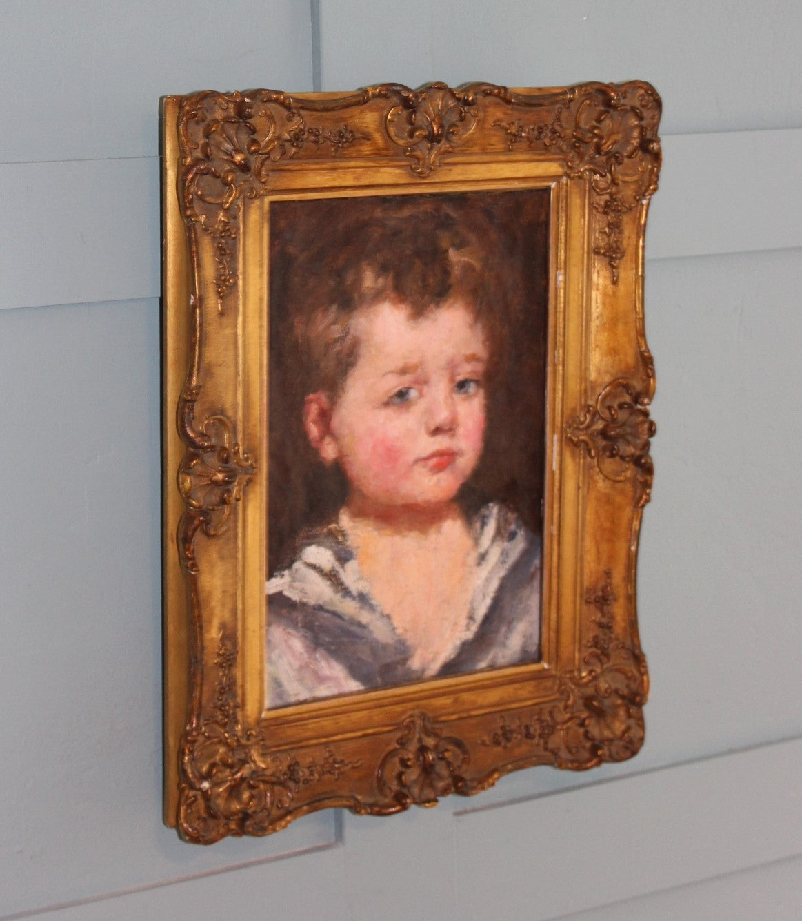 Restored oil painting of a sailor boy, circa 1920