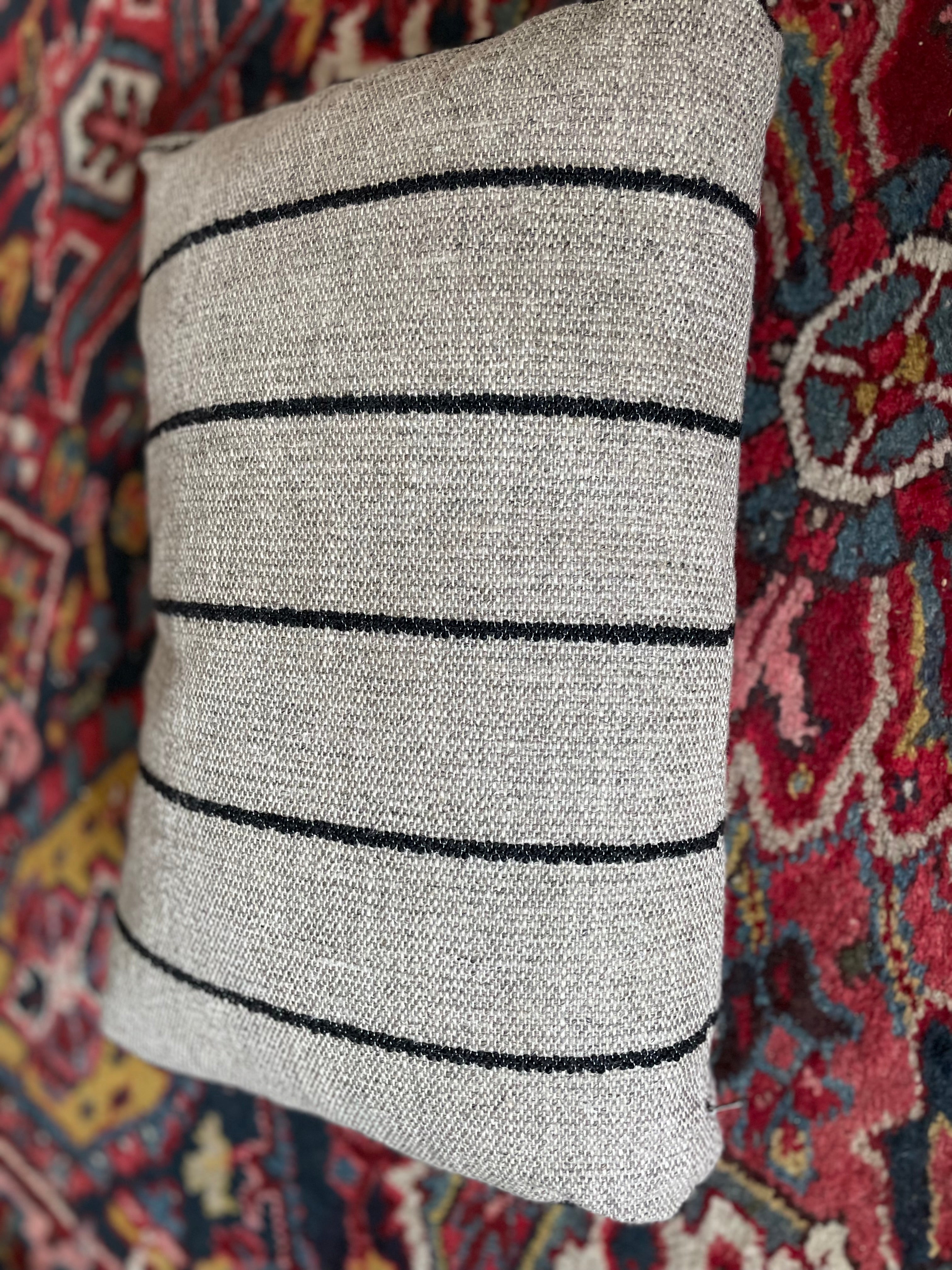 Neutral-tone bouclé cushion for retro decor