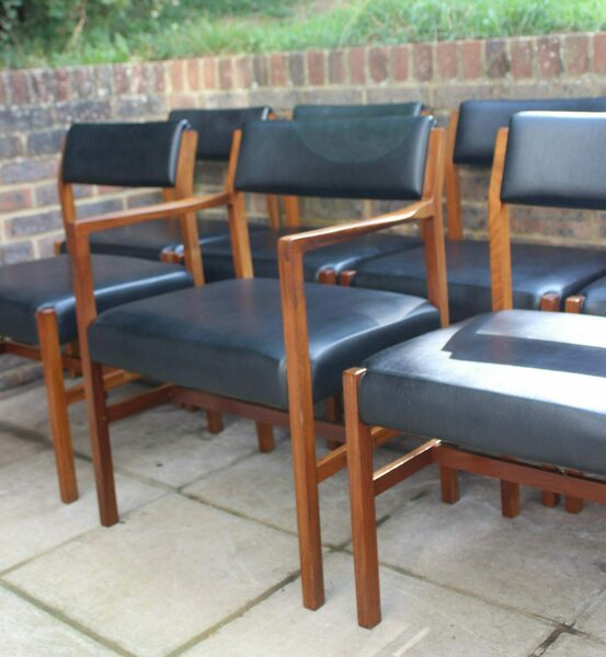 Vintage teak and leather lounge chair by Alfred Cox