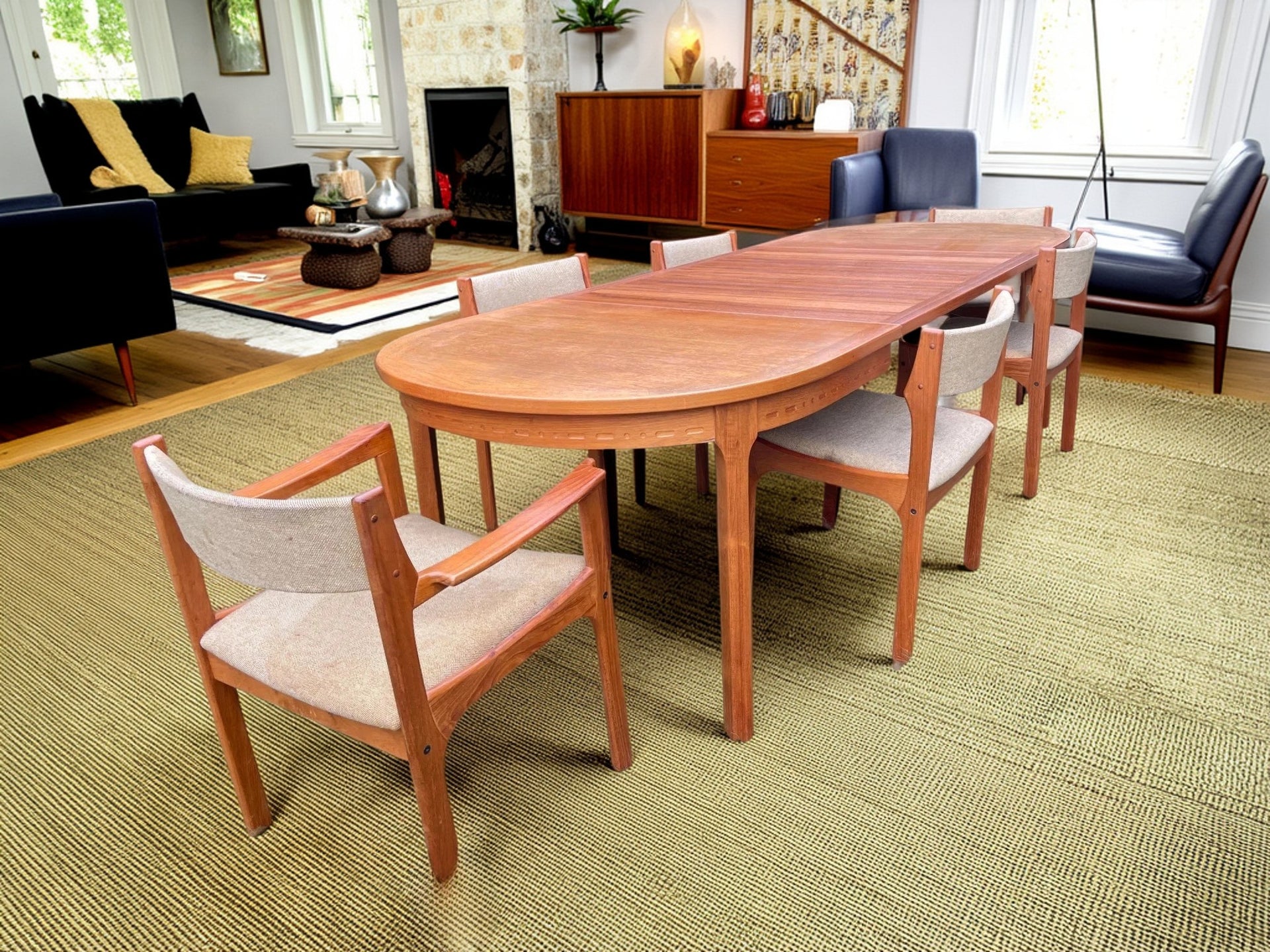 Double Extending Teak by Nils Jonsson for Troeds dining table with chairs in a living room setting