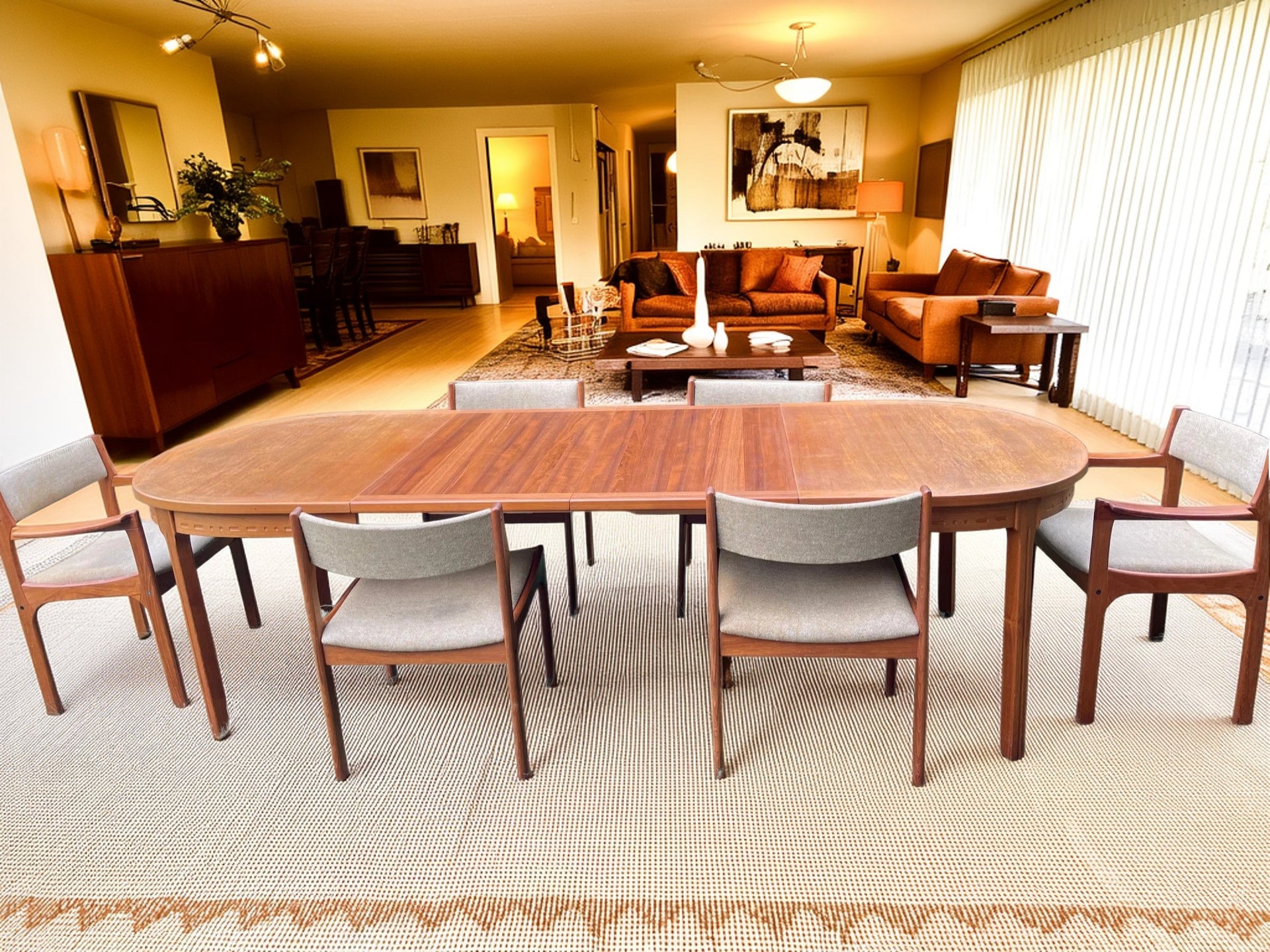 Troeds Dining room set with wooden table and chairs in a well-lit living room.