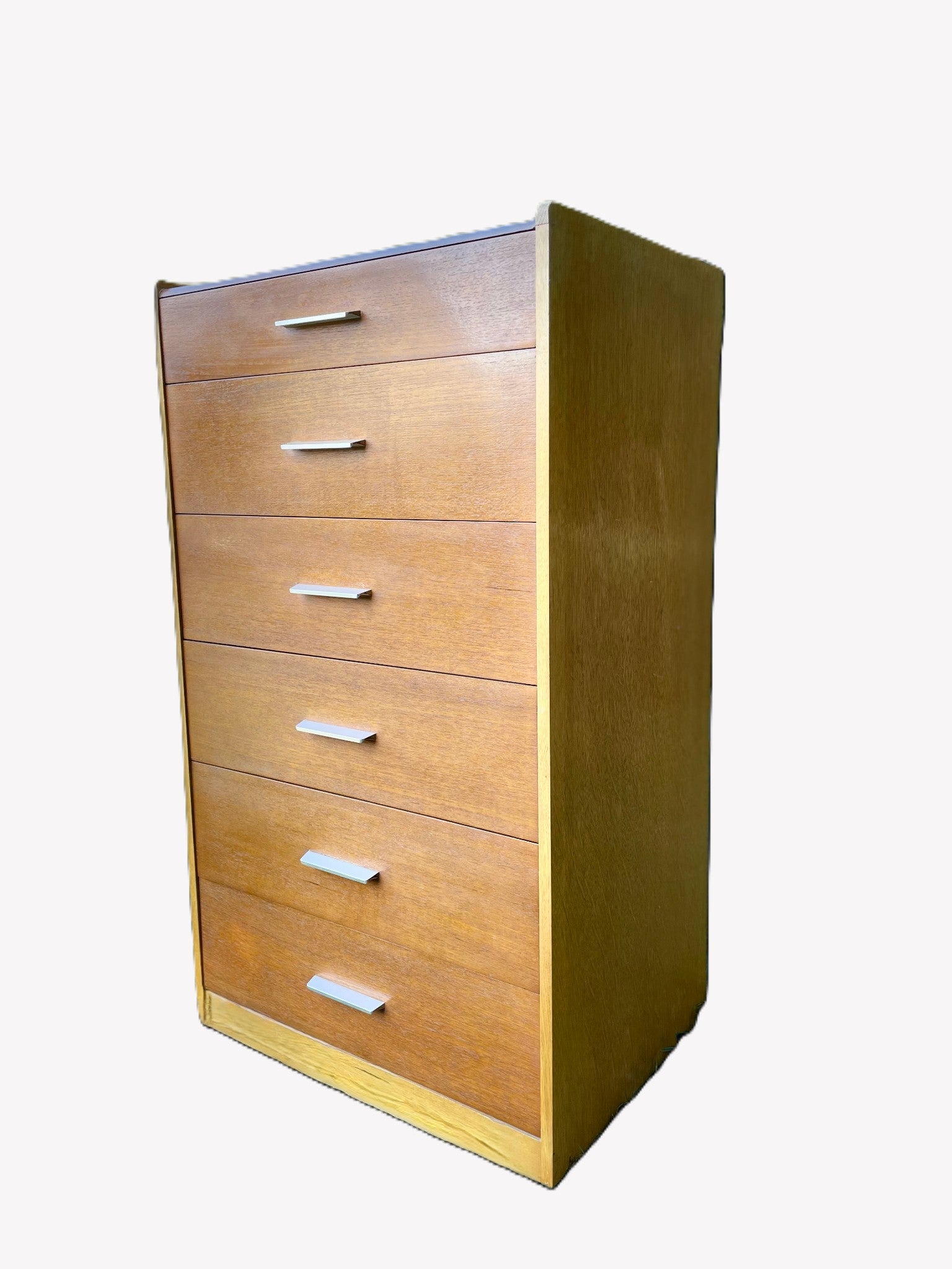 Wooden dresser with multiple drawers on a white background