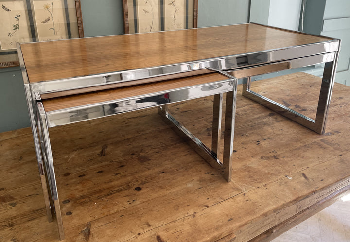 Vintage coffee table set in front of brown leather sofa