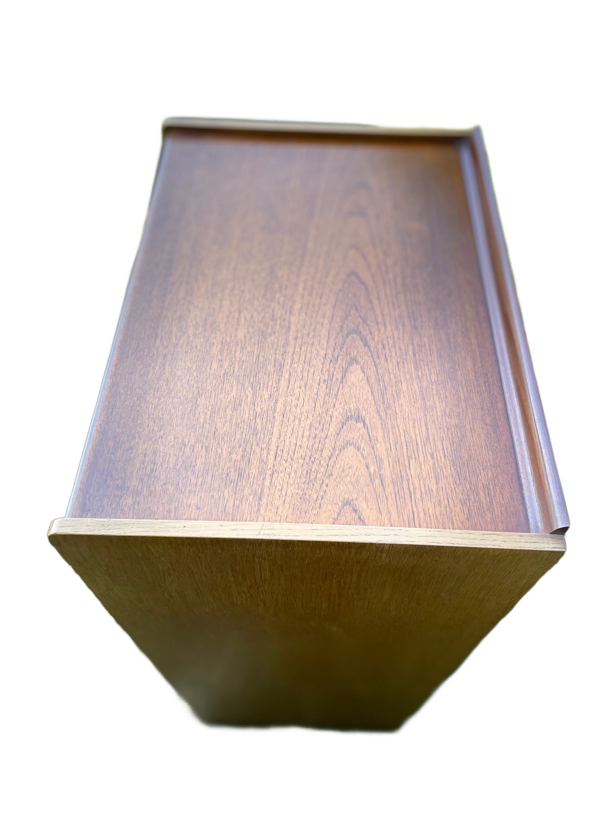 Wooden lamp with a textured finish on a white background
