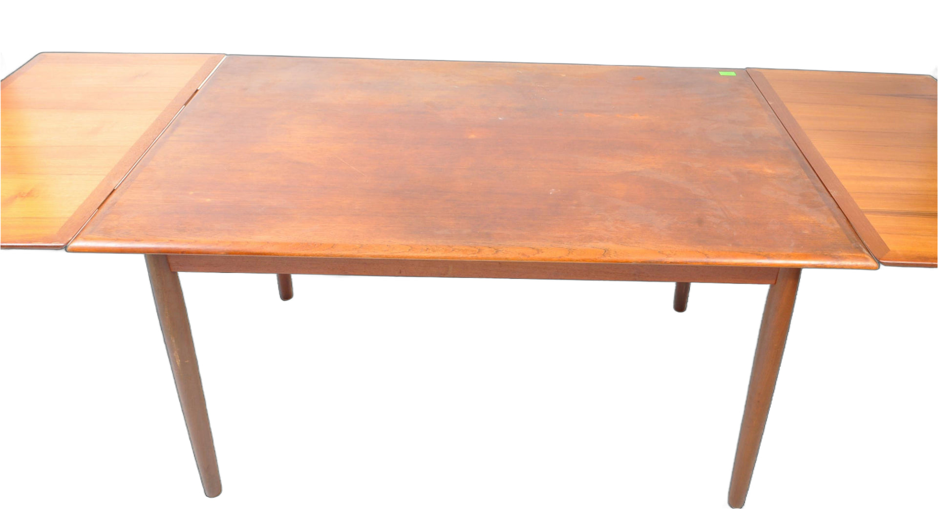 Scandinavian dining room with vintage teak furniture and modern decor