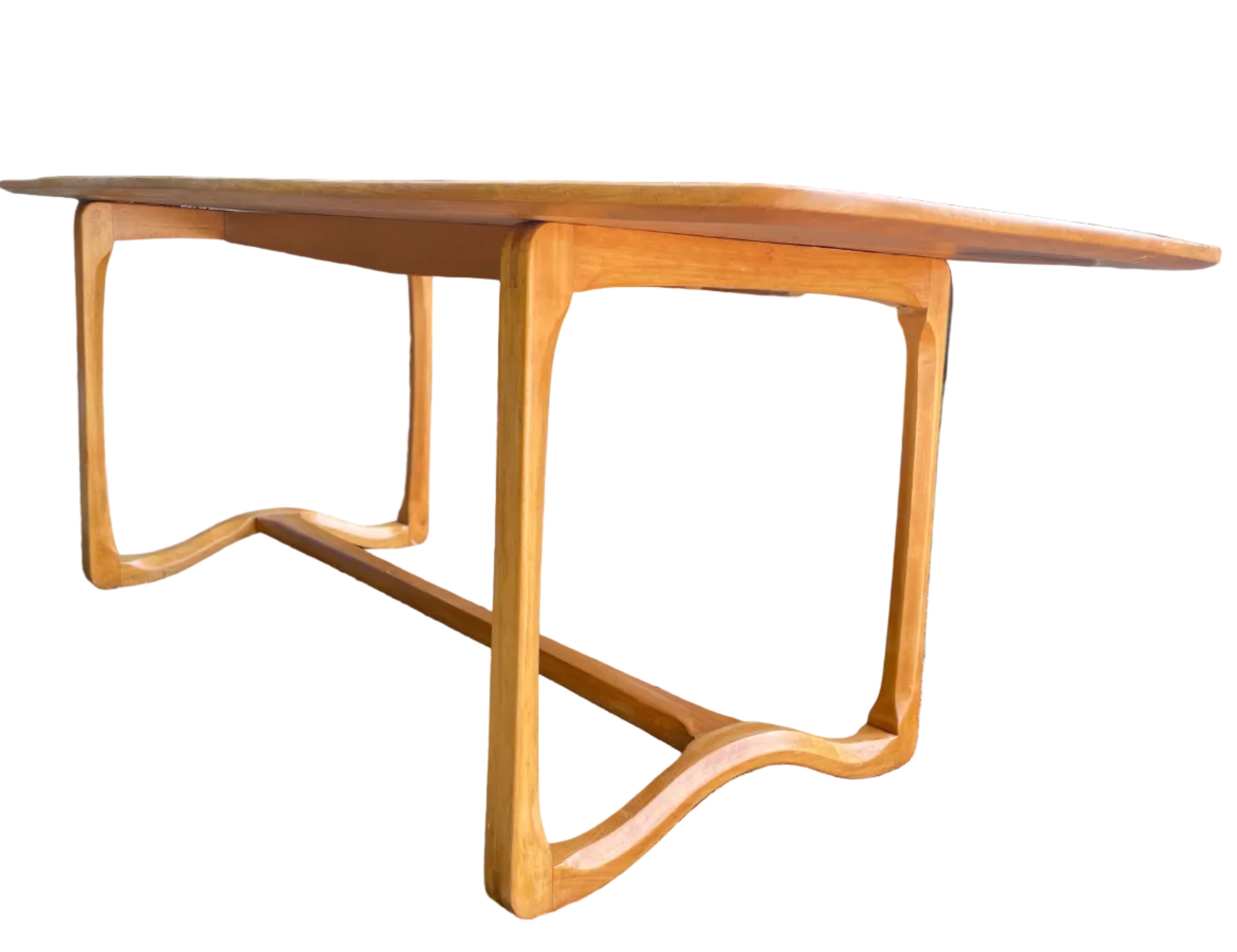 light natural wood dining table with a unique wavy pedestal base,
