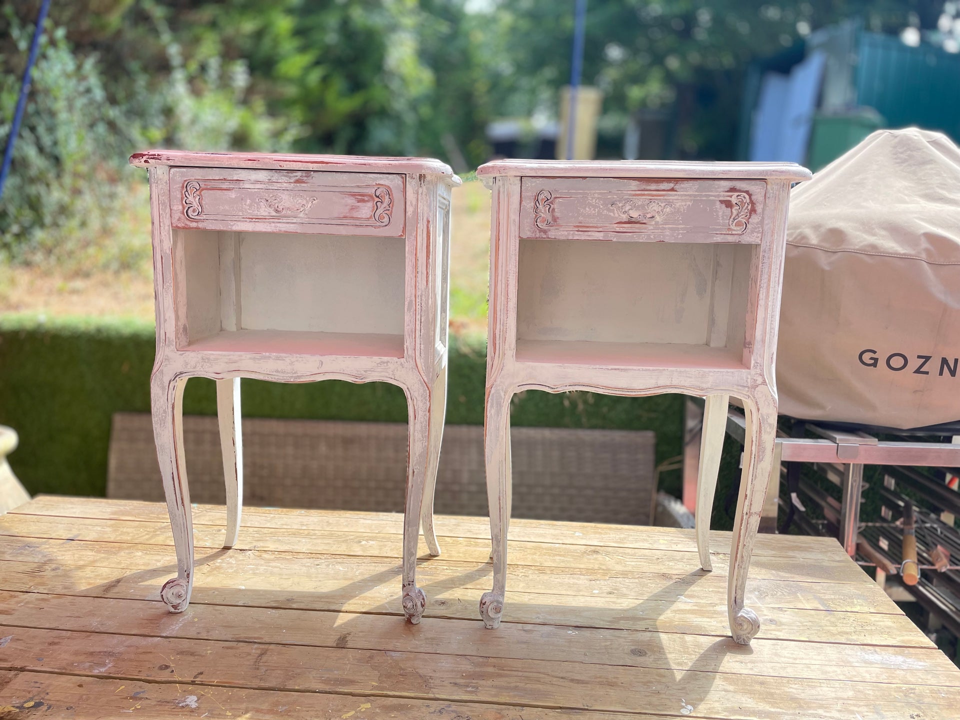 A pair of French White Bedside Cabinets