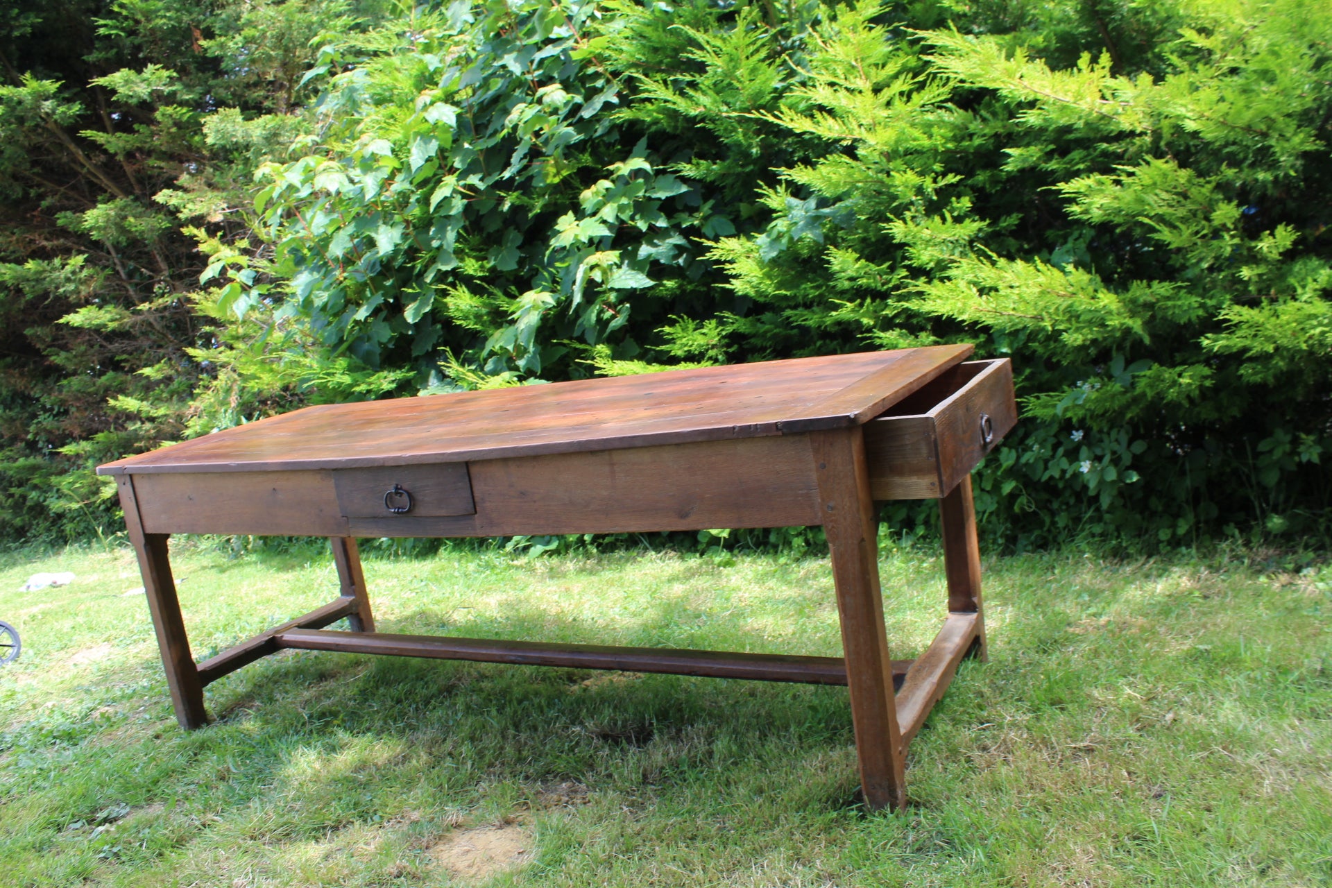 Antique cherrywood farmhouse dining table in Sussex, England