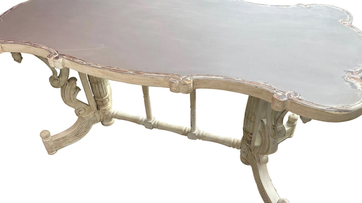 A distressed white carved wooden Dining table French Painted