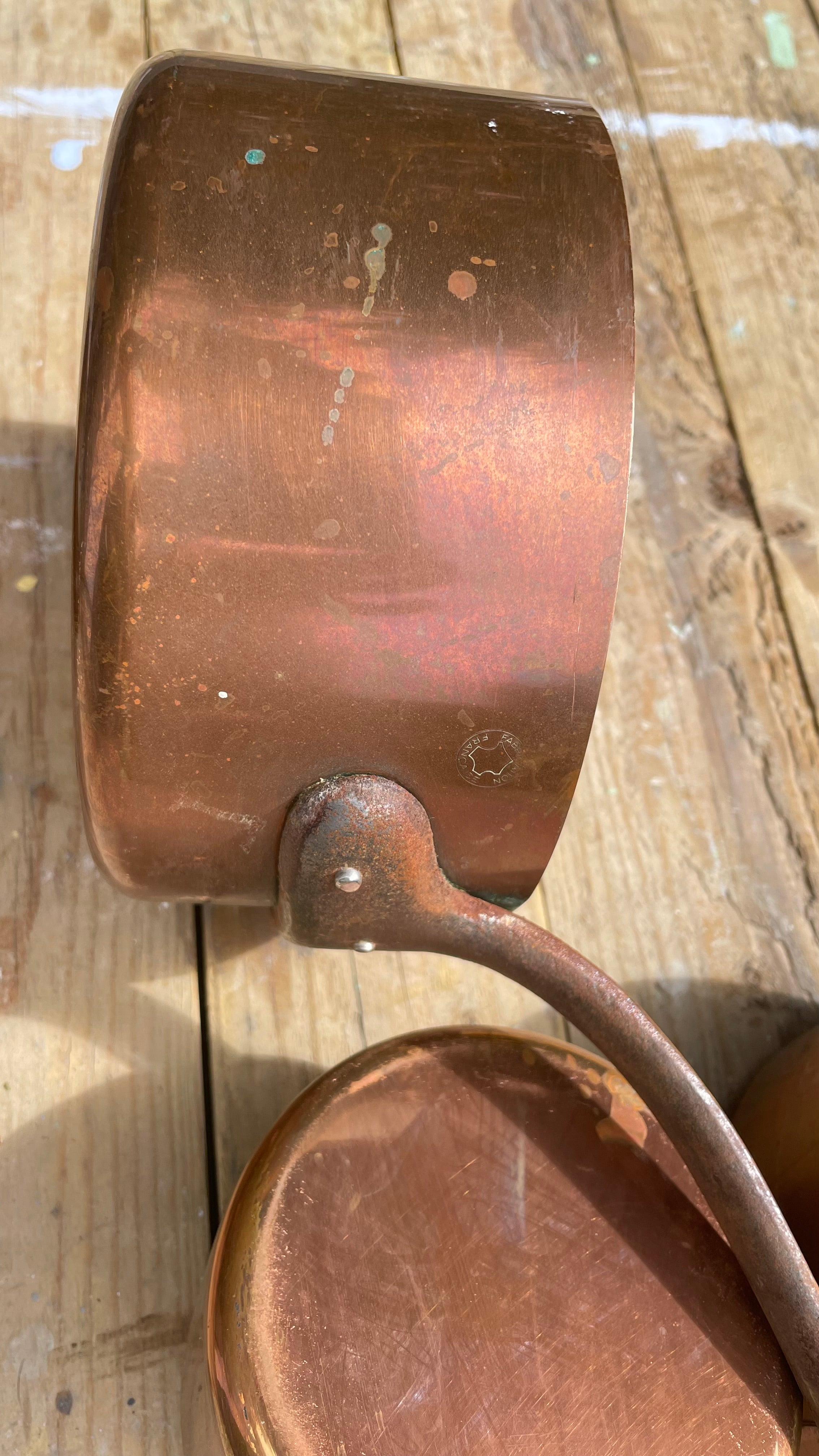 Copper saucepan French side view