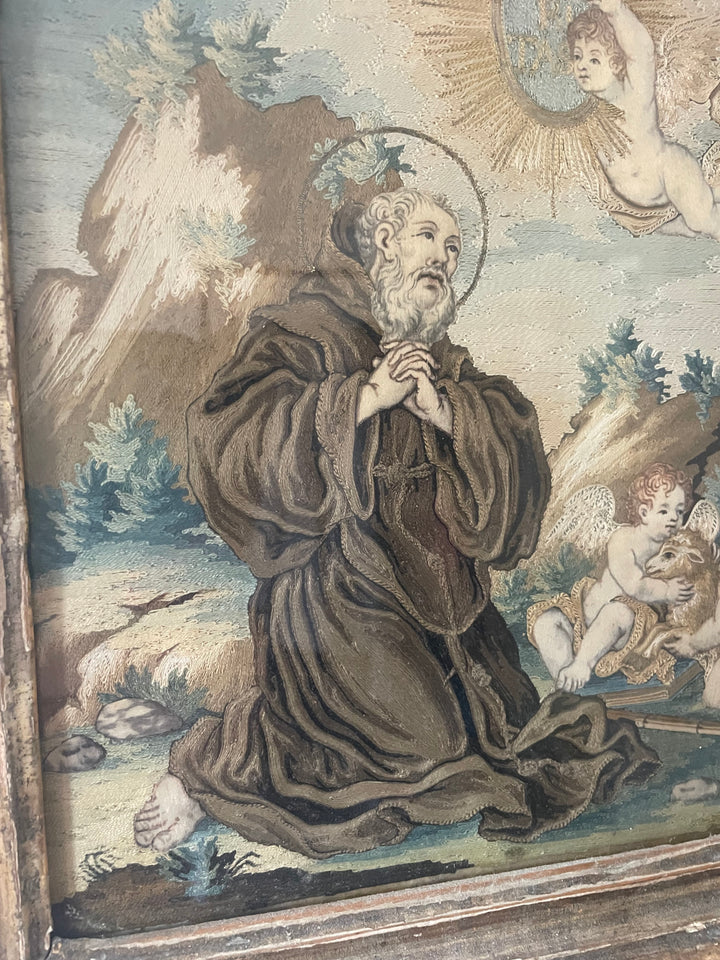 Elegant vintage Spanish silk art featuring St. Francis of Paola and intricate religious detailing