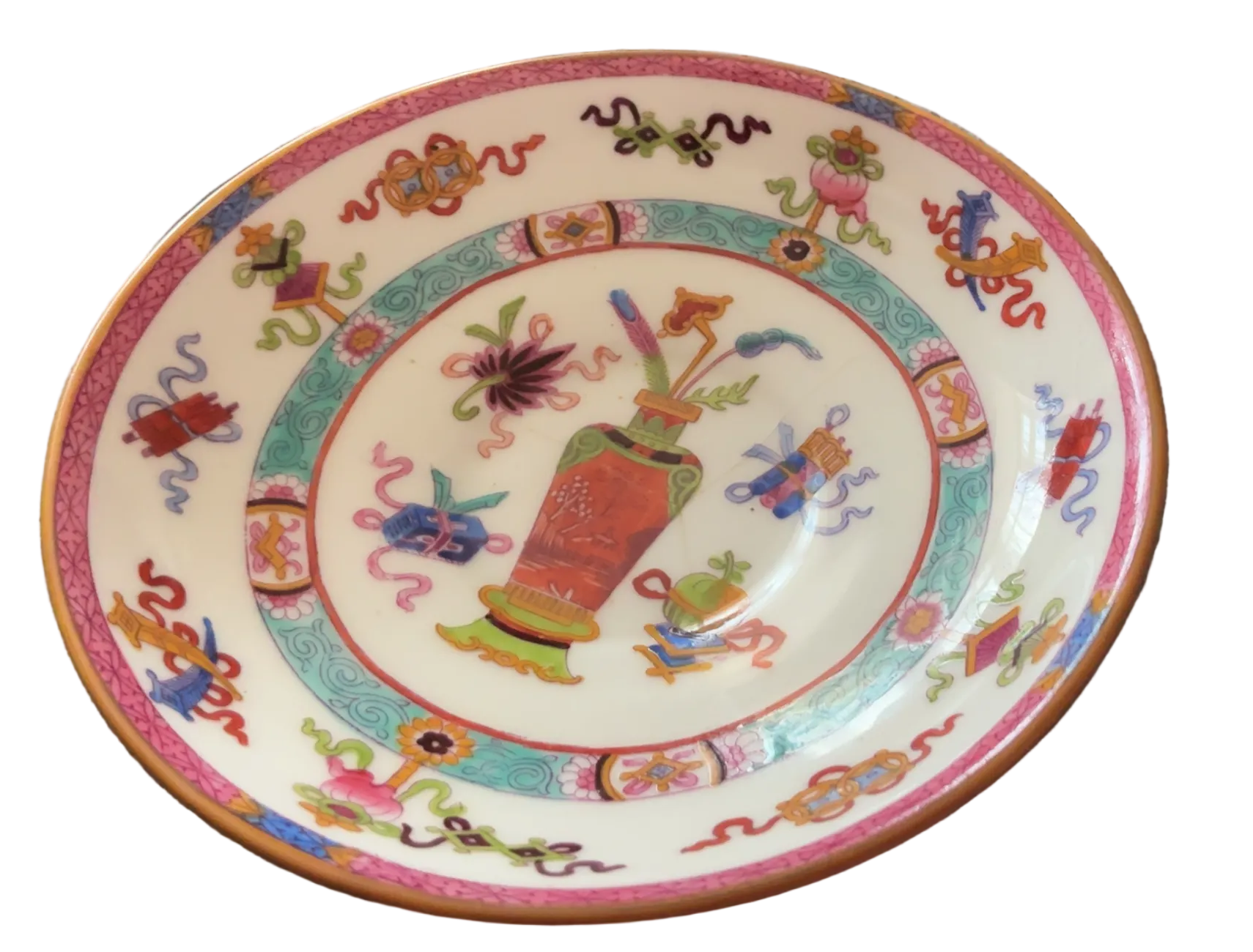 colorful hand-painted ceramic plate with a floral and decorative pattern
