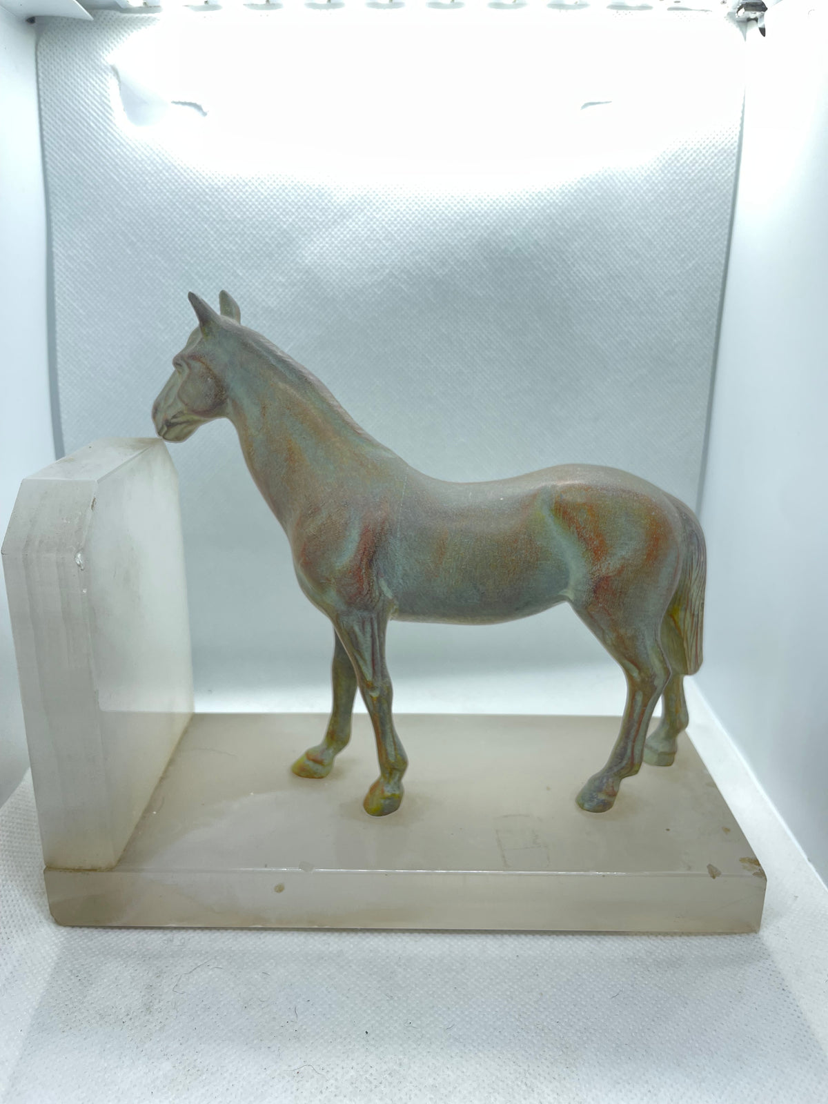 A Pair of Art Deco Style Patinated Bronze & Onyx Horse Bookends