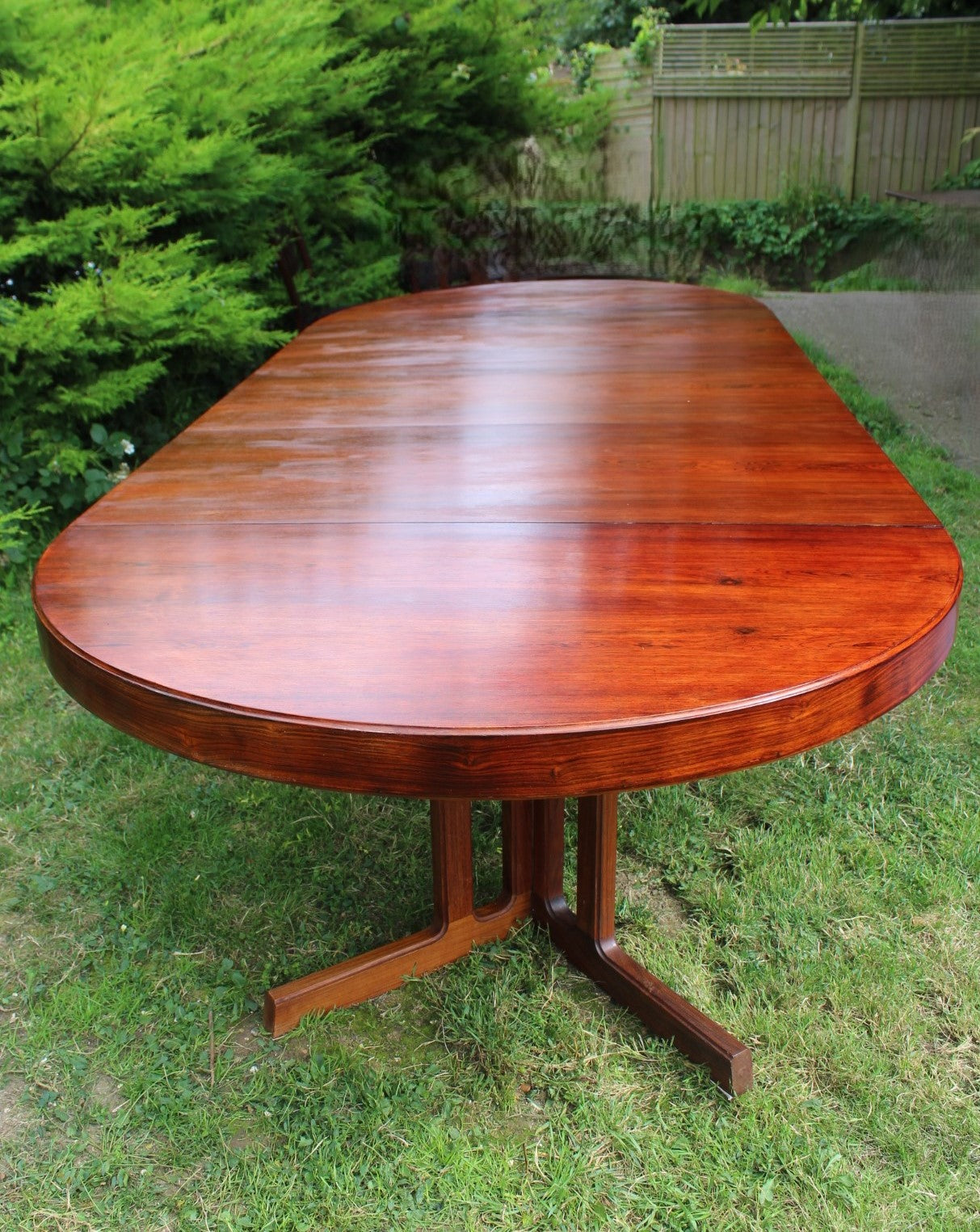 Johannes Andersen Danish modern table extended with three leaves.