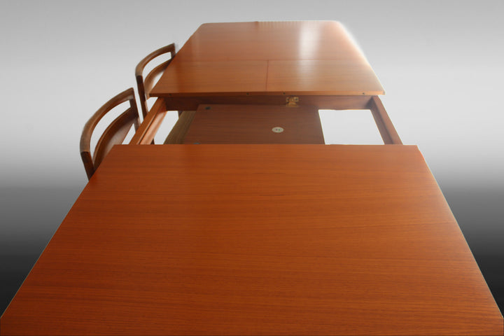 Mid-century modern teak dining table
