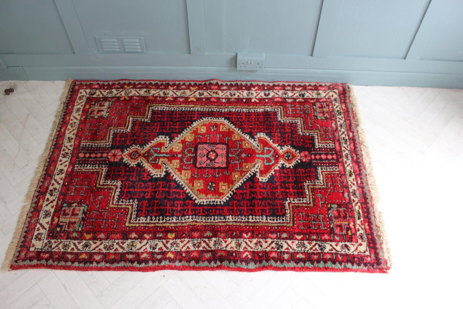 Persian medallion rug, 5ft by 3ft 6, showcasing timeless craftsmanship from the 1970s.
