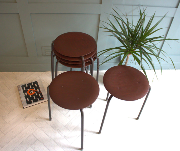 Refurbished 1950s Fritz Hansen teak stool with original foot cappings