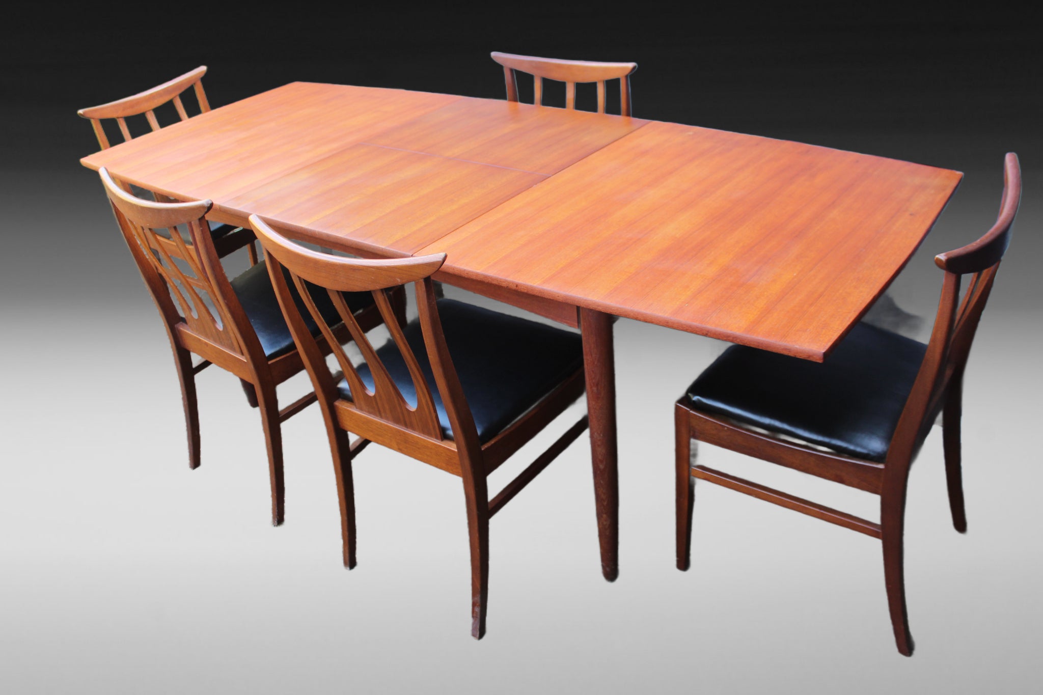 Retro A Younger dining table with a warm wood grain finish