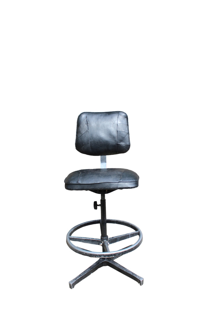 Retro industrial machinist chair with chrome backing plate and steel base