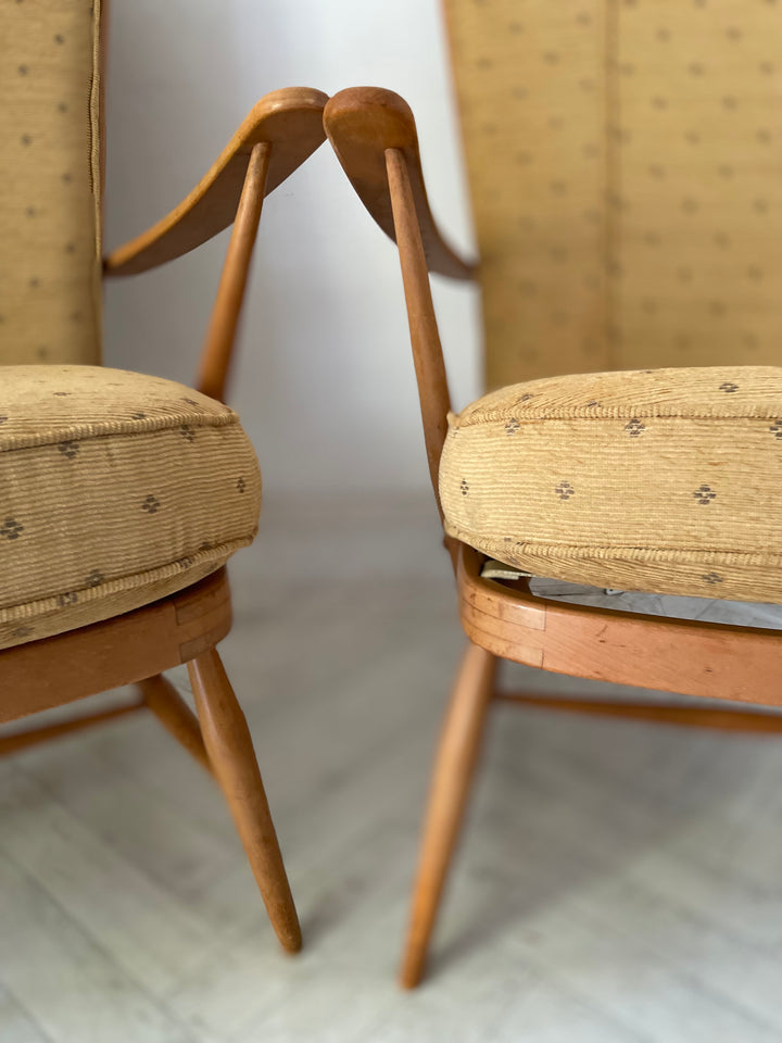 Set of two Ercol Model 478 Windsor armchairs, showing the corner joints in beech 