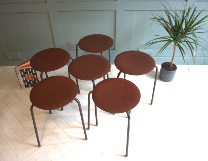 Set of vintage mid-century teak tripod stools by Fritz Hansen