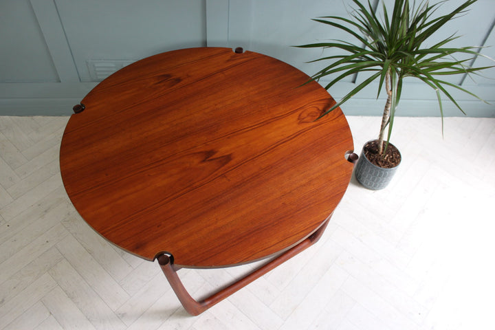 "Classic mid-century round teak coffee table by France & Son, Danish design with solid wood construction."
