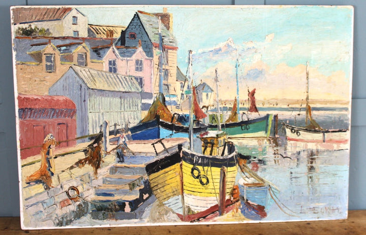 Tranquil Seaside Scene with Sunlit Harbour and Fishermen