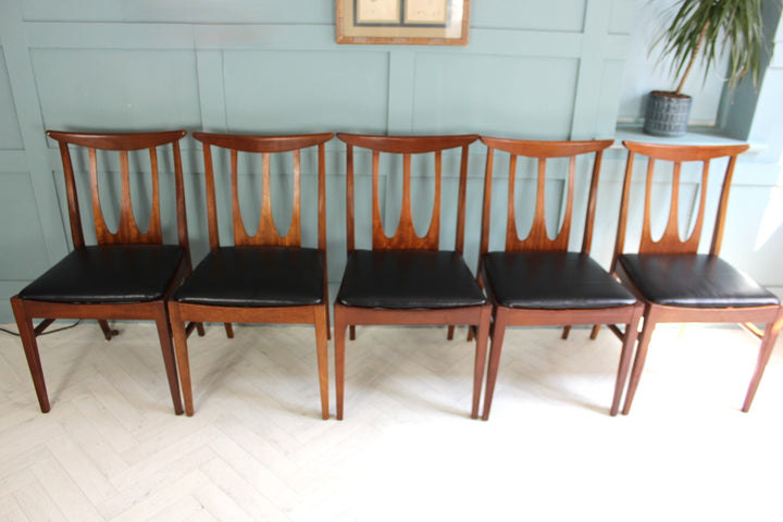 Vintage G Plan dining chairs with black vinyl seats and sculptural teak frames