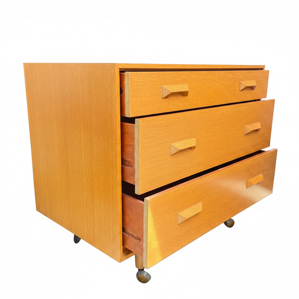 Wooden chest of drawers angled view by Stag