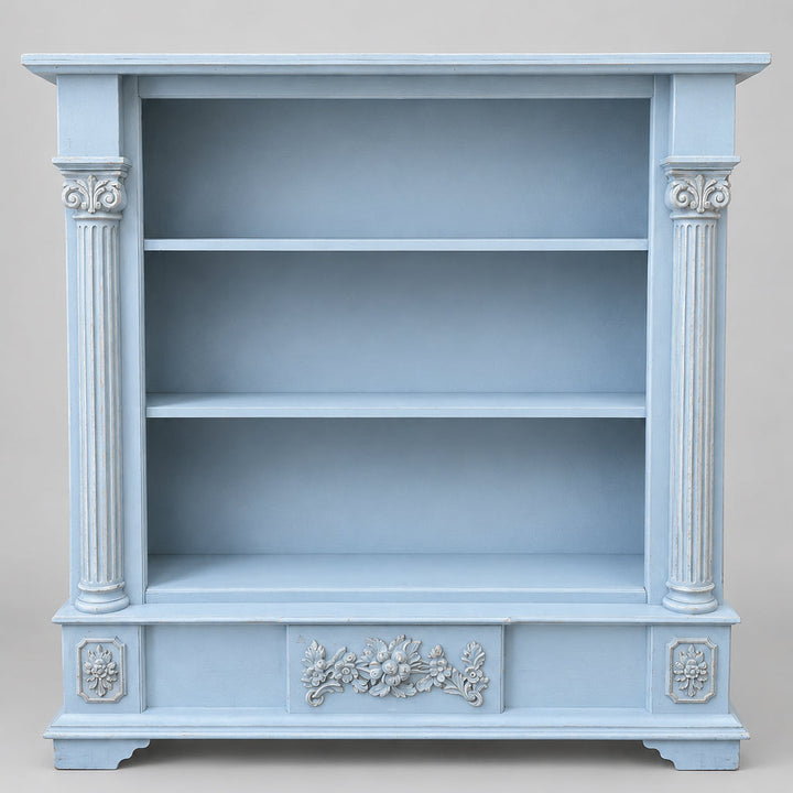 blue painted wooden bookcase with decorative pillars and shelves