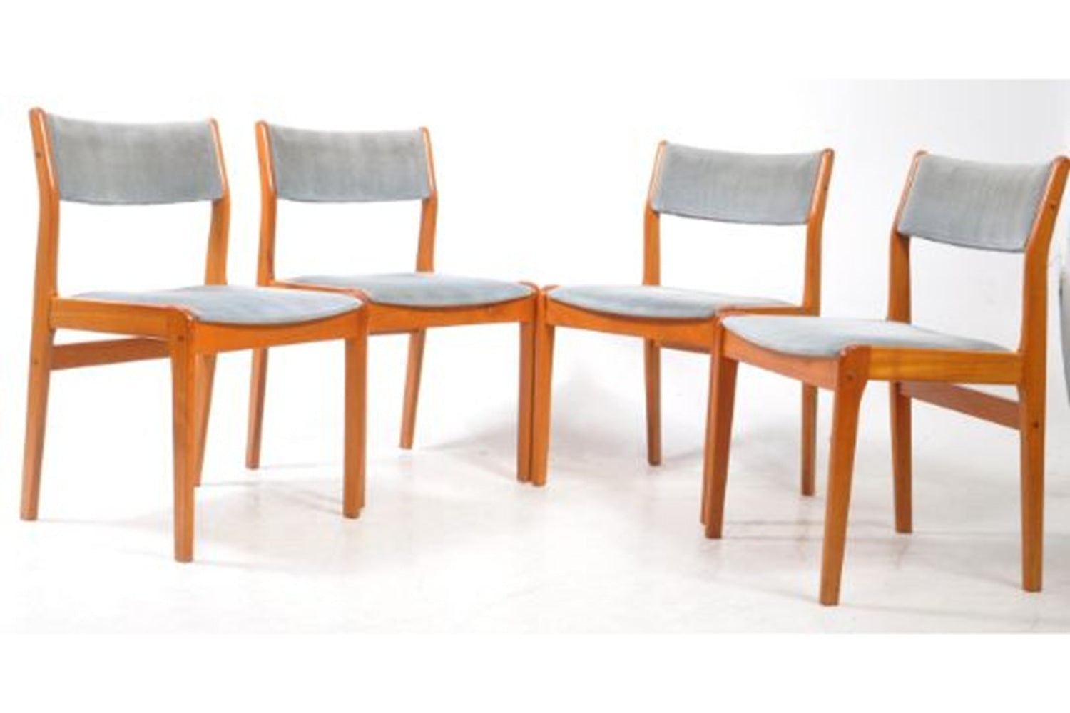 Set of four Farstrup Danish teak dining chairs with blue upholstery

