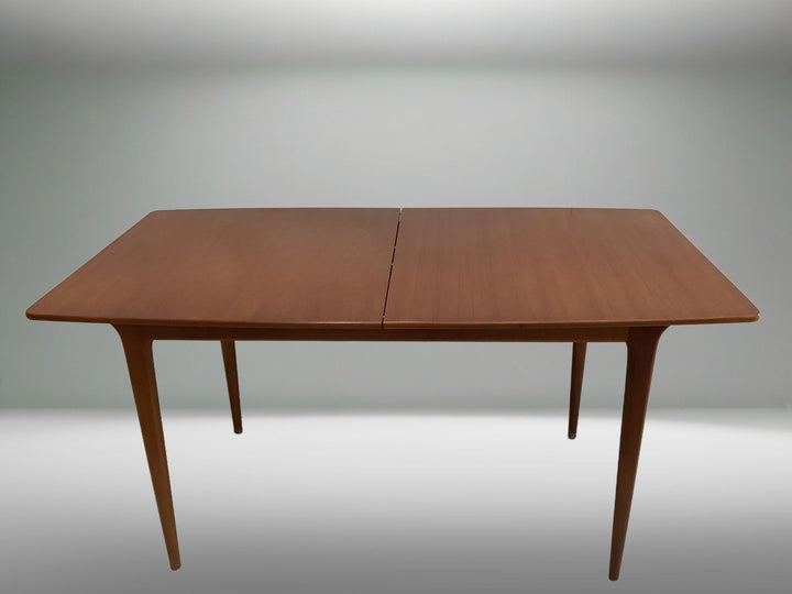 Closed McIntosh T2 dining table in teak with clean mid-century design and tapered legs Sussex