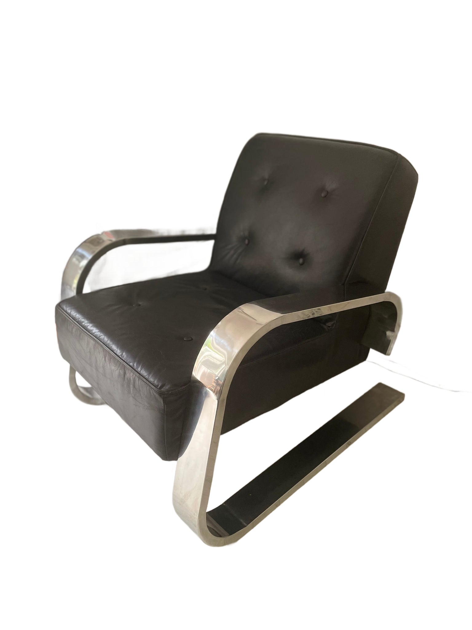 Vintage Mid century Modern black leather chair with chrome metal frame on a white background